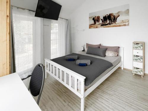 Ένα ή περισσότερα κρεβάτια σε δωμάτιο στο Schwanenburg Apartments