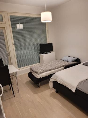 Katil atau katil-katil dalam bilik di Bright studio apartment on the 6th floor