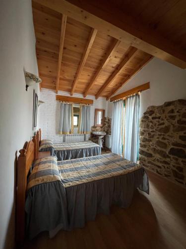 Postel nebo postele na pokoji v ubytování Casa rural La Pila