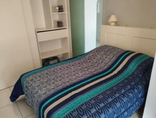 Postel nebo postele na pokoji v ubytování Appartement "Les Mouettes" 36m2 proche plages