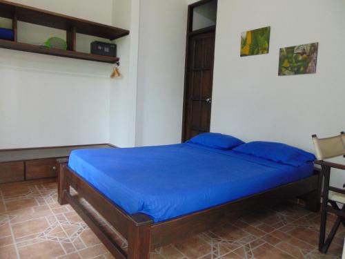 Postel nebo postele na pokoji v ubytování Hostal Suna Vito