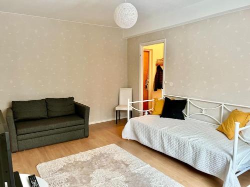 Postel nebo postele na pokoji v ubytování Apartment Mariankatu