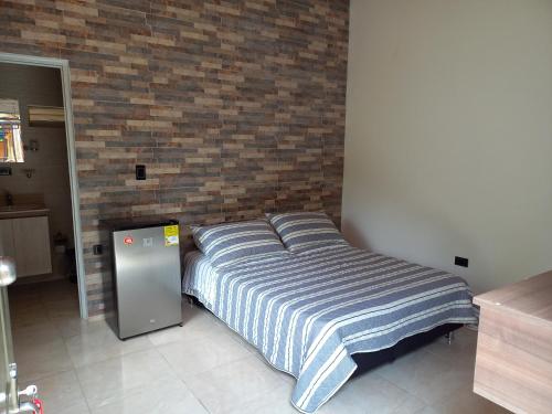 Letto o letti in una camera di hotel villa paz d f