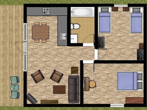 a floor plan of a small house with furniture at Beech Lodge 6 Hot Tub in York
