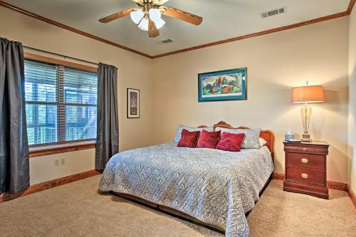 a bedroom with a bed and a ceiling fan at New Orleans Waterfront Home with Private Dock! in New Orleans