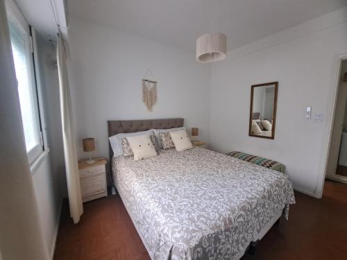 מיטה או מיטות בחדר ב-Alojamiento Entero Barrio Agronomia