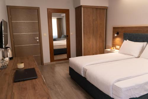 Ένα ή περισσότερα κρεβάτια σε δωμάτιο στο Guest House Velik