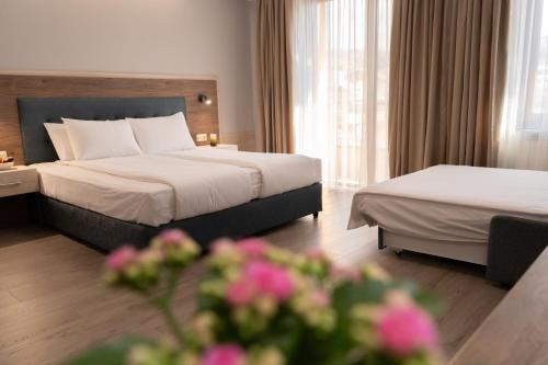 Ένα ή περισσότερα κρεβάτια σε δωμάτιο στο Guest House Velik