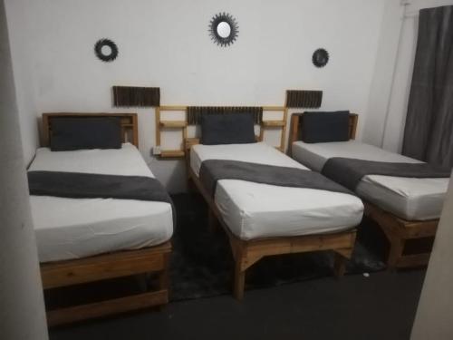Un pat sau paturi într-o cameră la Dream villa