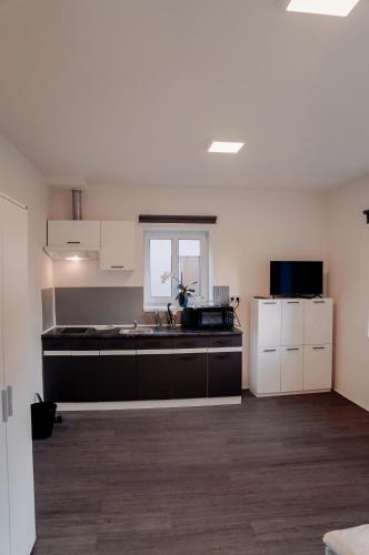 Apartmány Centrumにあるキッチンまたは簡易キッチン