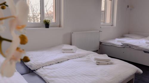 Apartmány Centrumにあるベッド