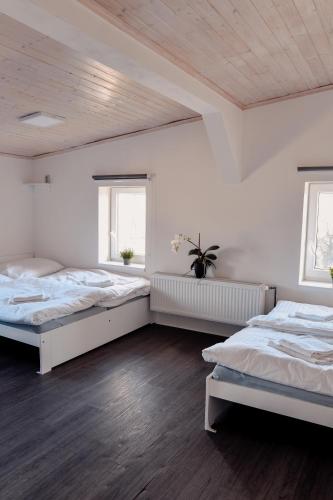 Apartmány Centrumにあるベッド