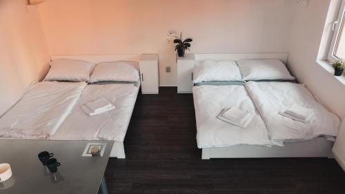Apartmány Centrumにあるベッド