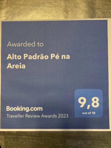 a sign that says awarded to alto palomo paedia p pa pa pa at Alto Padrão Pé na Areia in Florianópolis