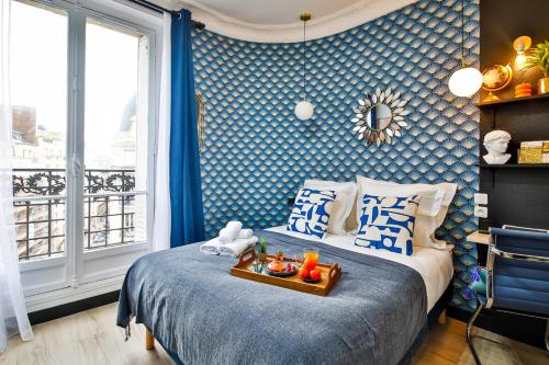 Letto o letti in una camera di WS Tour Eiffel - Laos
