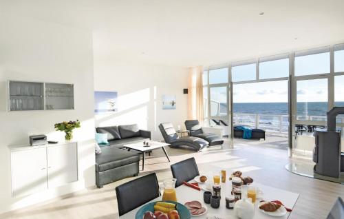 a living room with a view of the ocean at Appartement Seestern E in Schönhagen