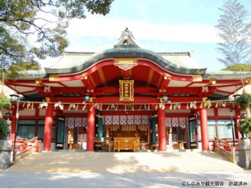 a temple in a park with red columns at HOTEL U's Kouroen - Vacation STAY 11253v in Nishinomiya