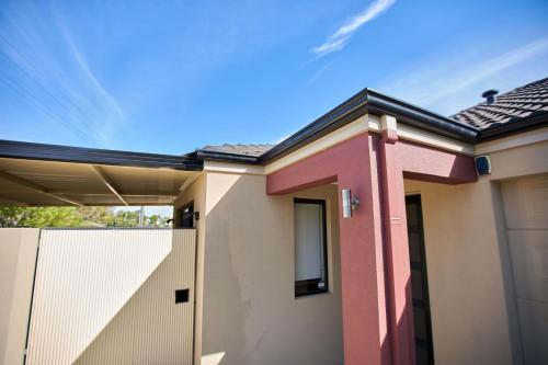 a rendering of a house with pink at Gorgeous Family House near Shops in Perth