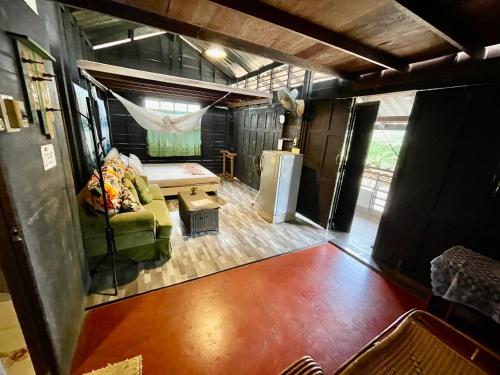 an aerial view of a living room in a trailer at Pano Solar Guest House (พาโน โซล่า เกสเฮ้าส์ ) in Trat