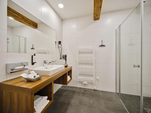 Koupelna v ubytování Hofwirthotel