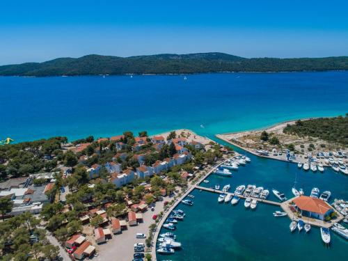 an aerial view of a marina with boats at Amadria Park Camping Sibenik Mobile Homes in Šibenik