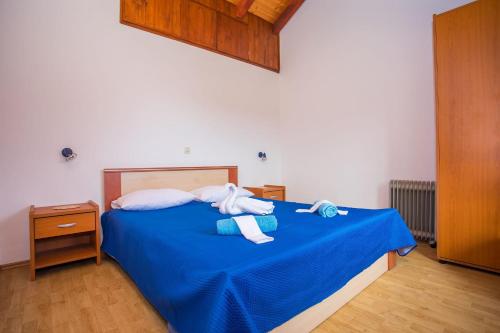 Ένα ή περισσότερα κρεβάτια σε δωμάτιο στο CHEAP APARTMENT near OMIŠ
