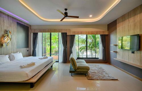 Ένα ή περισσότερα κρεβάτια σε δωμάτιο στο Mangrovebay Krabi Beachfront Pool Villa