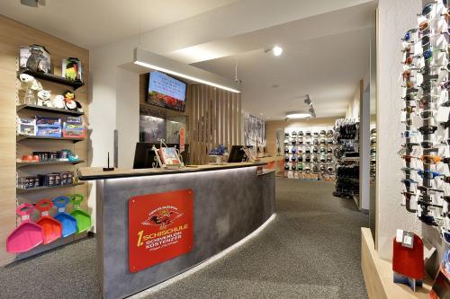 a store with a counter in a pharmacy at Landhaus Kostenzer mit Sauna in Fügen