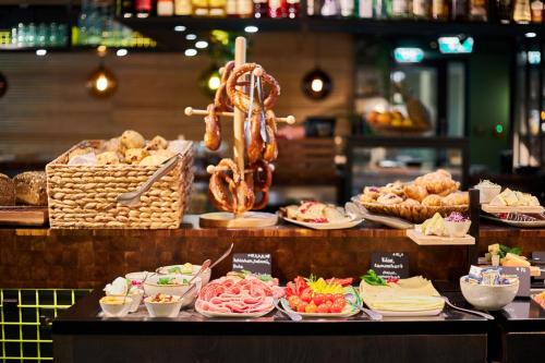 a buffet with different types of food on display at Cocoon Sendlinger Tor in Munich