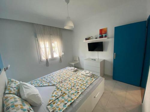 Postel nebo postele na pokoji v ubytování Asprovalta SUNNY HOUSE