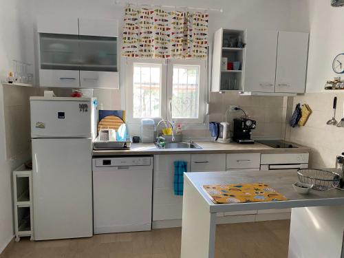 Kuchyň nebo kuchyňský kout v ubytování Asprovalta SUNNY HOUSE