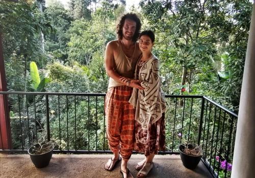a woman and a girl standing on a balcony at Tantra Ella Lodge in Ella