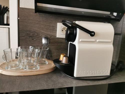Príslušenstvo na prípravu kávy alebo čaju v ubytovaní La Boutique Studio centre ville