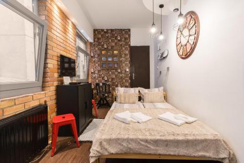 Postel nebo postele na pokoji v ubytování Cheerful studio Budapest downtown