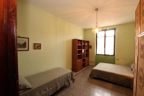 Katil atau katil-katil dalam bilik di Sacconi Flat