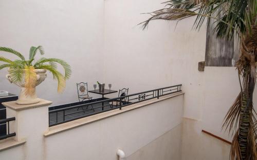 a stairway with a plant in a vase on it at Diegohousesleepaway in Vittoria