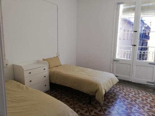 Katil atau katil-katil dalam bilik di Apartment in Historic Centre 3rd floor