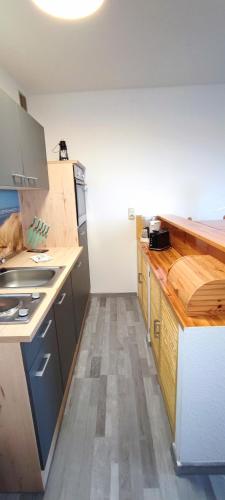 Kuchyň nebo kuchyňský kout v ubytování Bungalow Ückeritz