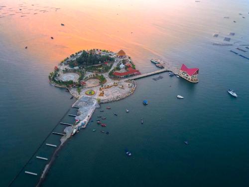 an aerial view of a small island in the water at Holiday Inn & Suites Siracha Laemchabang by IHG in Si Racha