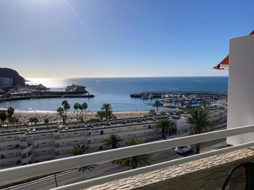 a view of the ocean from the balcony of a building at Tobago508 in Puerto Rico de Gran Canaria