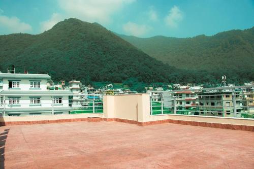 a view of a city from the roof of a building at Nagarjun View Homestay Apartment in Kathmandu