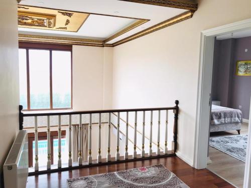 a staircase in a house with a ceiling at Kartepe Paradise in Kartepe