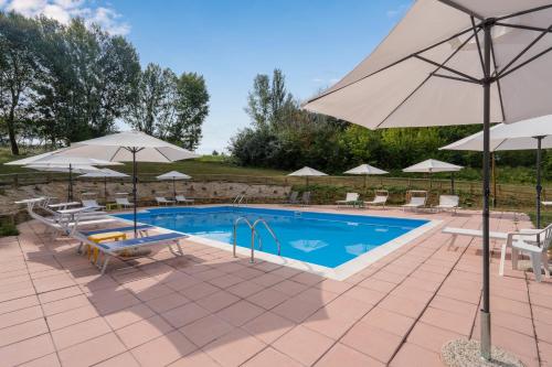 Bazén v ubytování Pulciano Apartments nebo v jeho okolí