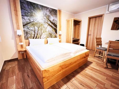 Postel nebo postele na pokoji v ubytování FeWo-Zimmer-Auszeit