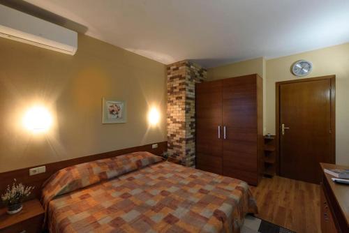 Ένα ή περισσότερα κρεβάτια σε δωμάτιο στο Cosy room in the center of Bansko