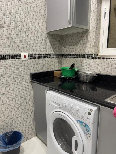 Η κουζίνα ή μικρή κουζίνα στο Al Qalah flats