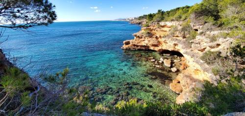 a view of the ocean from a cliff at Bella vista in L'Ametlla de Mar