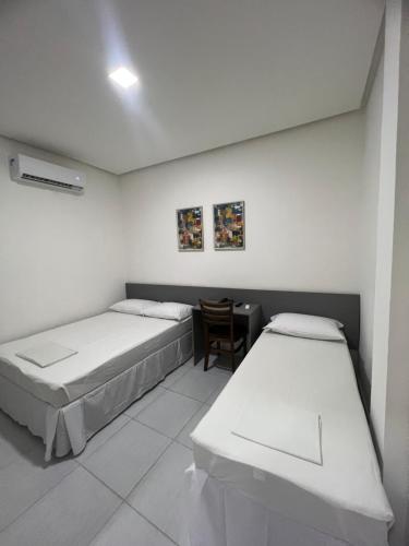 Cama o camas de una habitación en Destak Hotel Residence