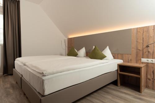 Кровать или кровати в номере Monteurwohnung