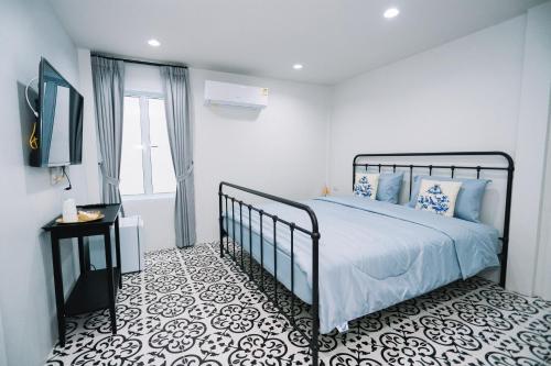 Una cama o camas en una habitación de Chertel Poshtel
